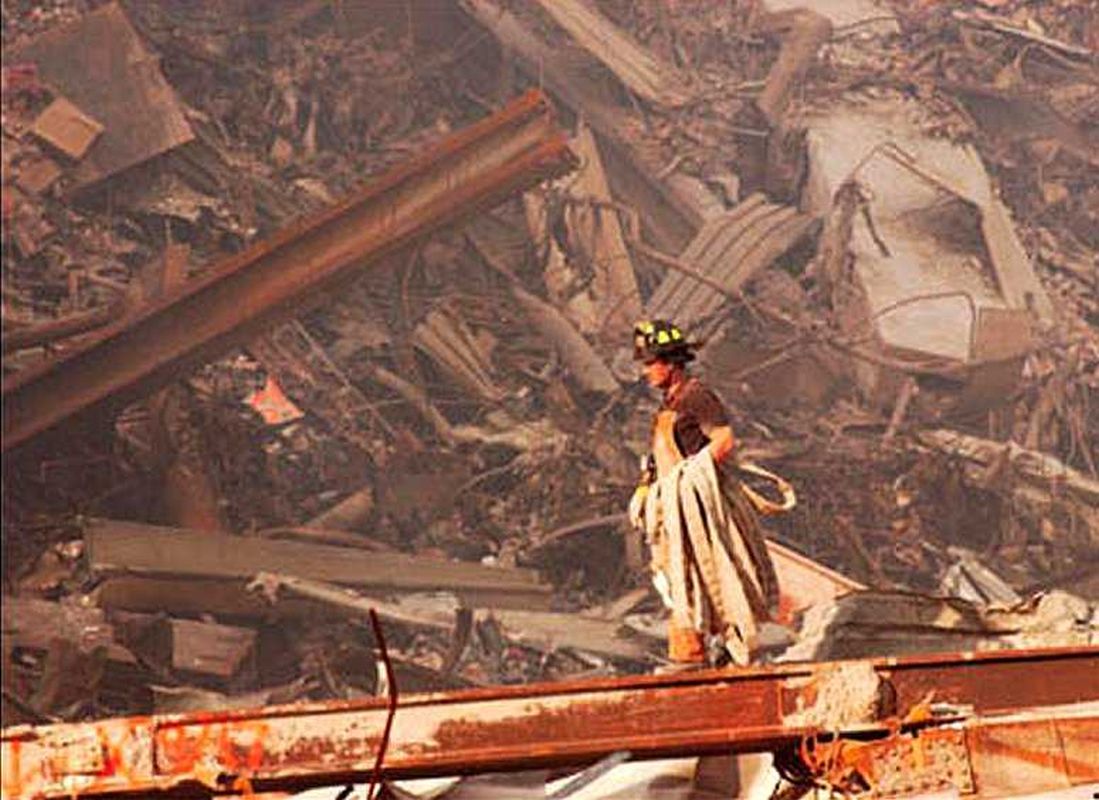 wtc_fireman_walking_rubble.jpg