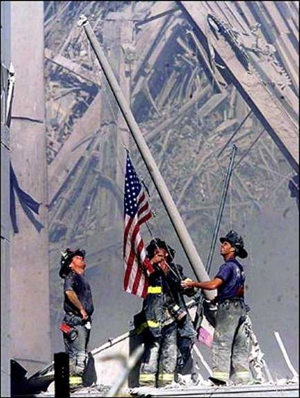 wtc_firemen_plant_flag.jpg